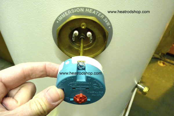 immersion thermostat being withdrawn